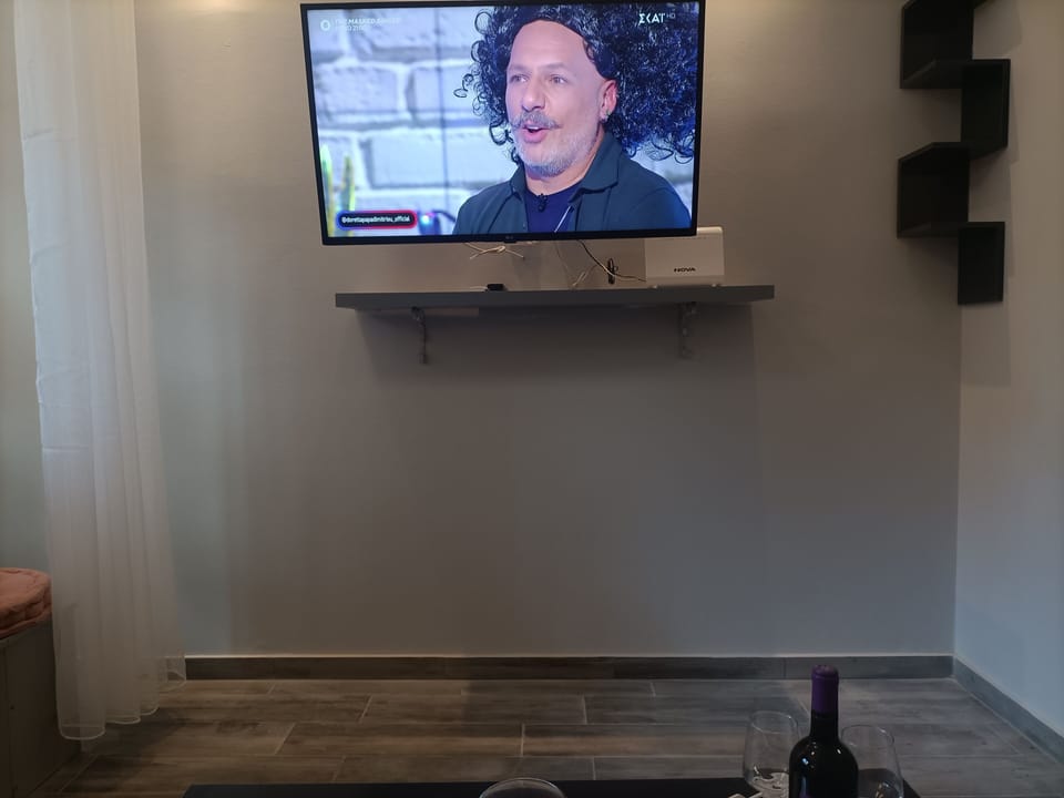 City Single Room | Living area | 43-inch Smart TV with digital channels