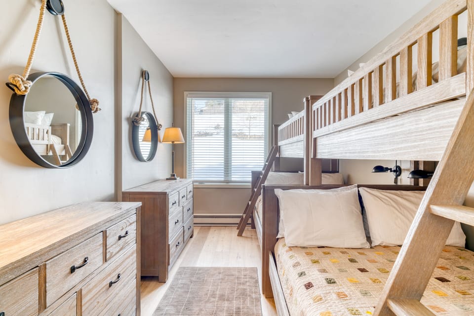 Bedroom 2 features 2 twin over full bunk beds.