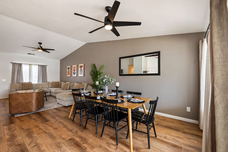 Dining area located between the kitchen and living area.