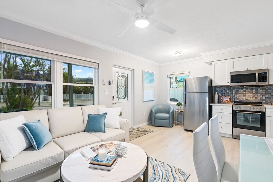 Open floor plan, with living room, eating area, & coffee area