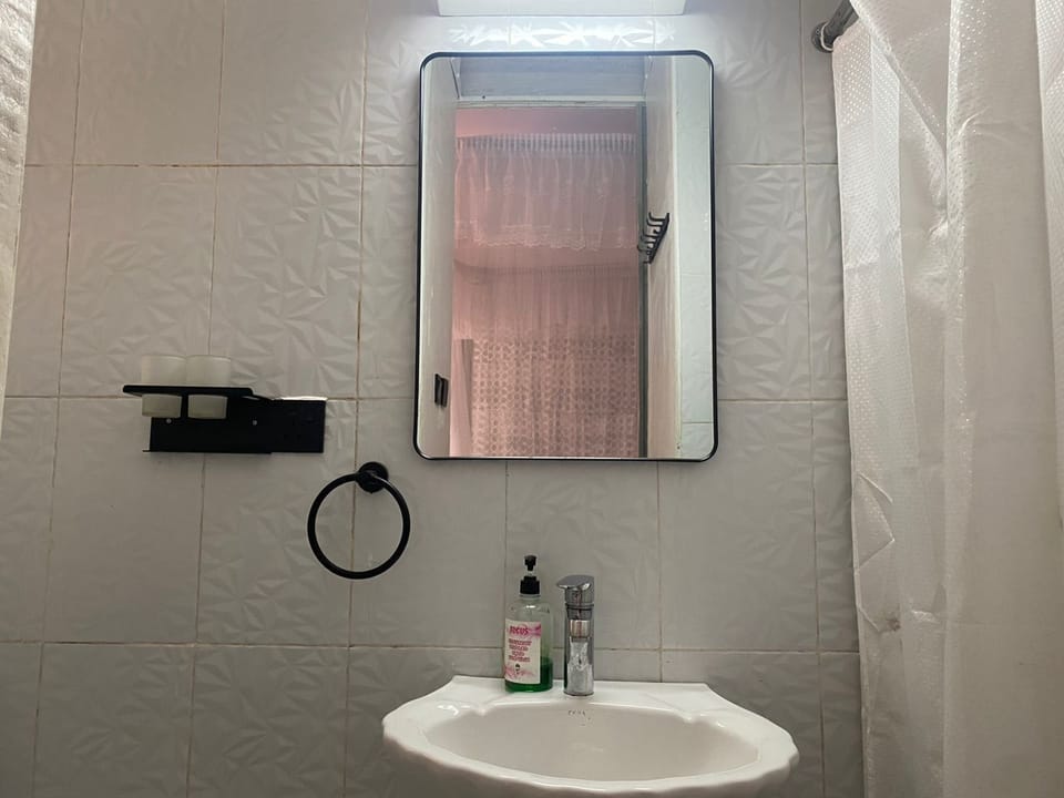 Deluxe Room, 1 Queen Bed, Patio | Bathroom | Hydromassage showerhead, slippers, bidet, towels