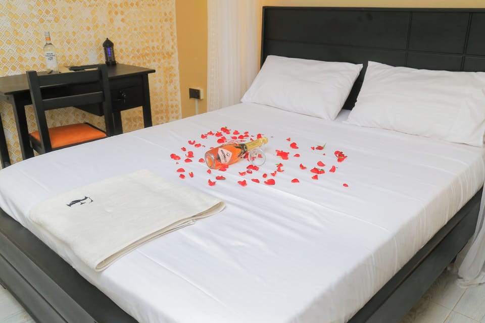 Deluxe Room, 1 Queen Bed, Patio | Individually furnished, desk, laptop workspace, free WiFi