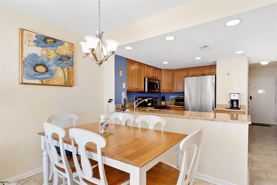 After whipping up that delicious meal in the kitchen, enjoy it with the whole family at this 6 person dining room table.