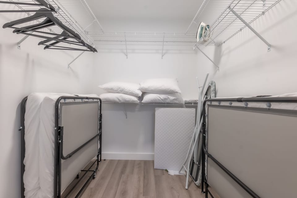 Closet with beds, sheets, duvets for you!