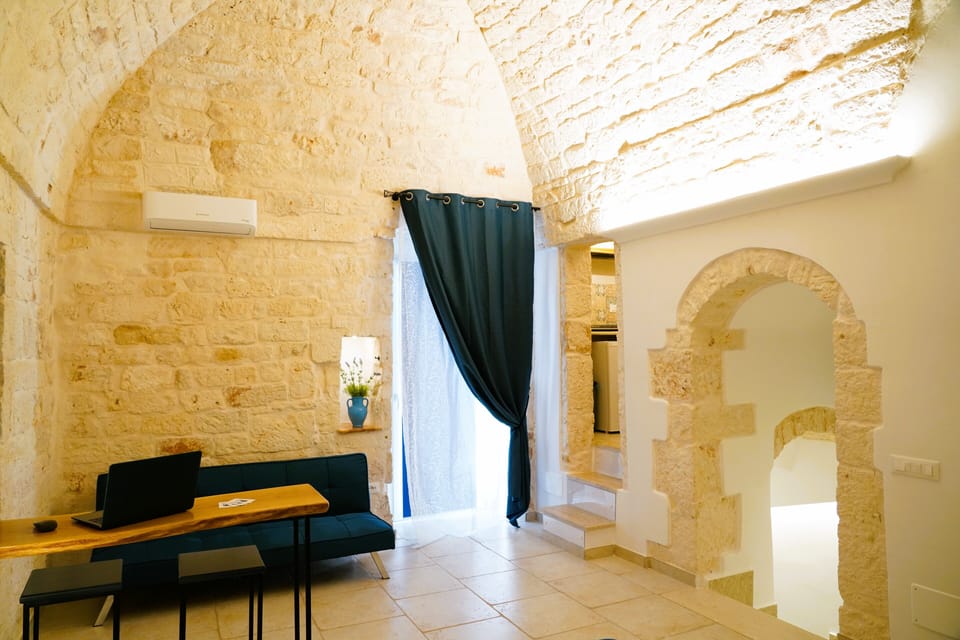 Superior House, City View | Living area | 32-inch flat-screen TV with cable channels