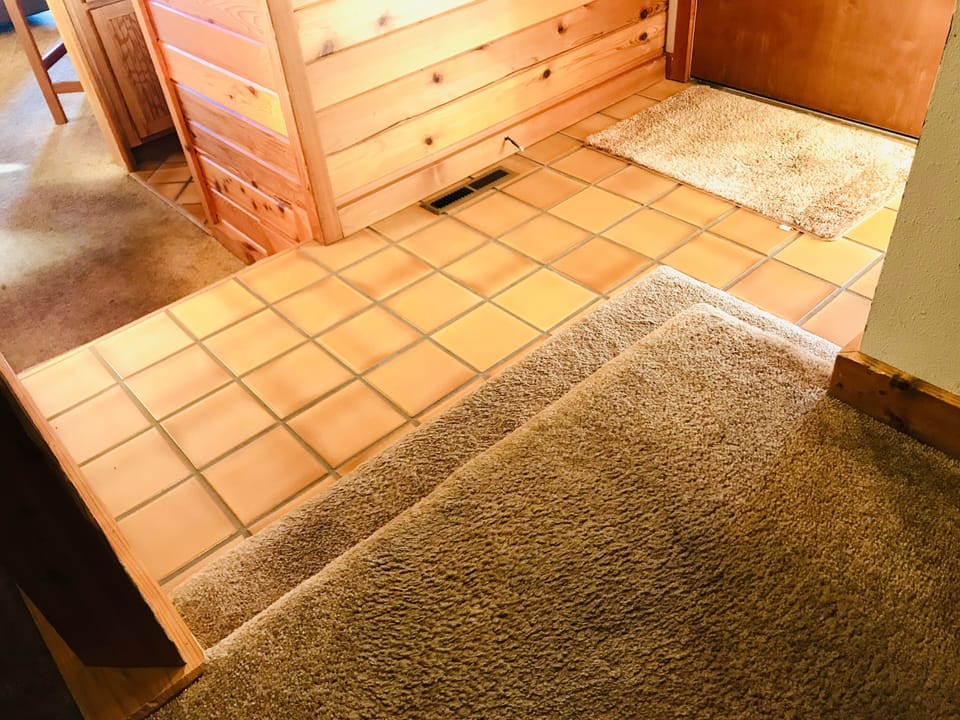 Two steps up from entrance to the Master bedroom