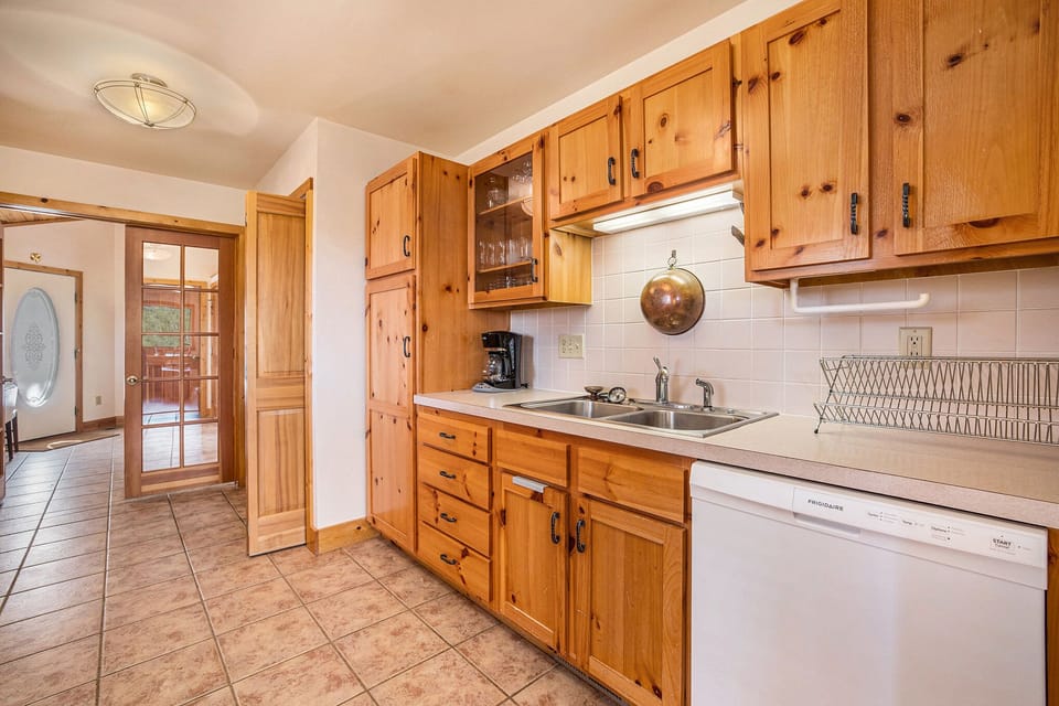 Kittery West Estes Park, Kitchen with dishwasher, double sink, and lots of counter space.