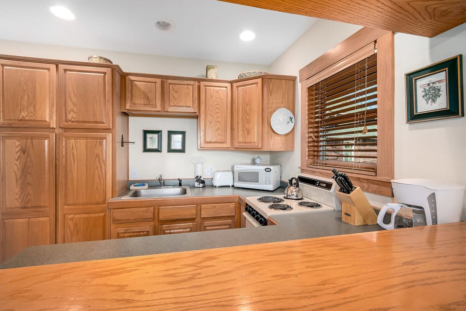 Plentiful cabinet space in the condo's kitchen.