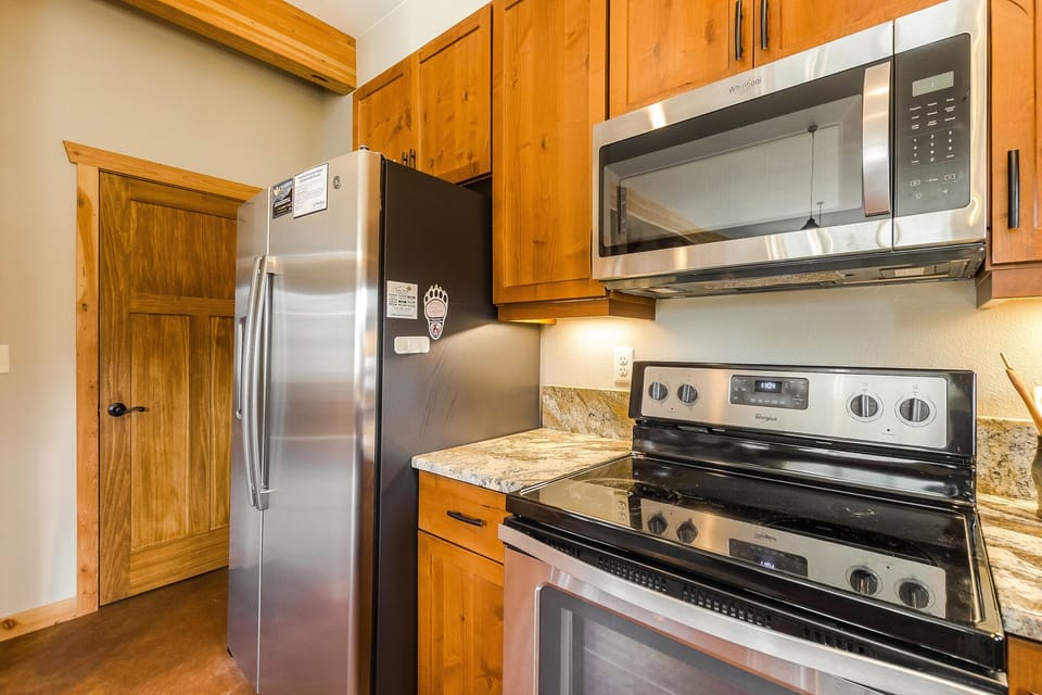 Kitchen with a full size refrigerator
