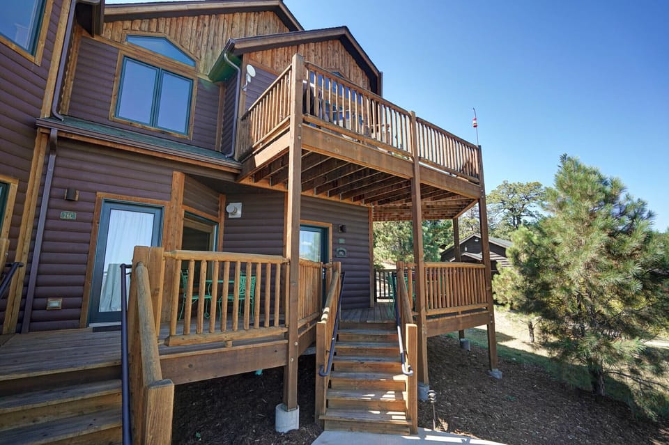 Exterior view several steps up from parking lot area, pathway with 7 steps up to your condo's deck and entryway.