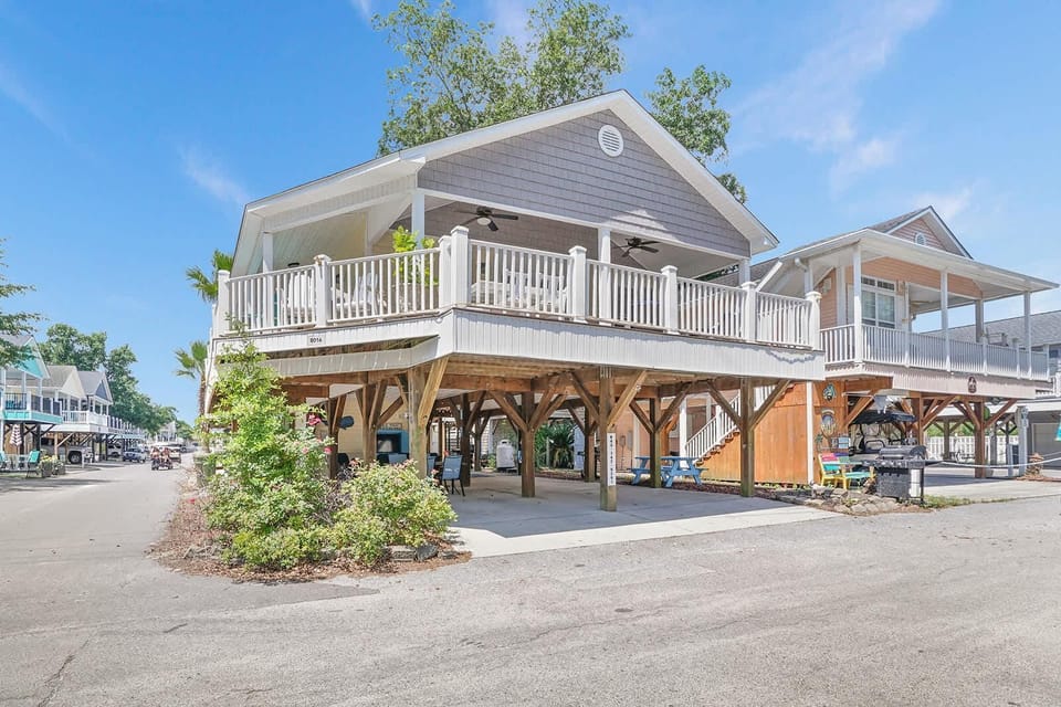 Spacious waterfront home with expansive balcony views