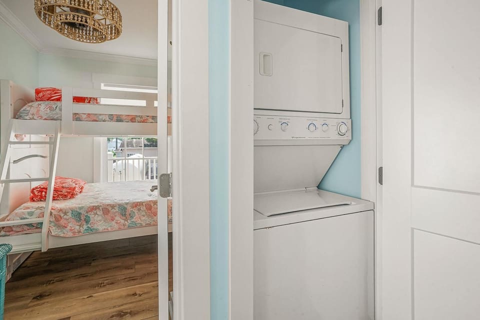 Convenient laundry nook just steps from cozy bedroom retreat