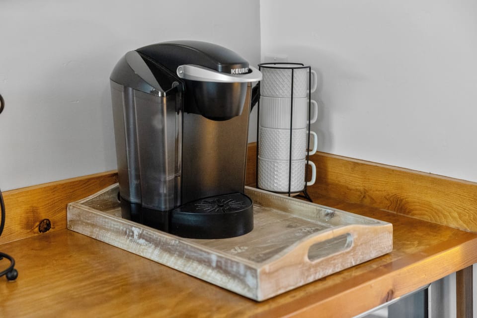 Includes a Kuerig, perfect for brewing your coffee without going downstairs.