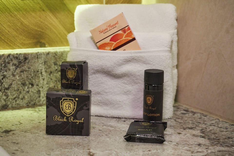 Standard Room, 2 Double Beds | Bathroom | Shower, rainfall showerhead, free toiletries, hair dryer