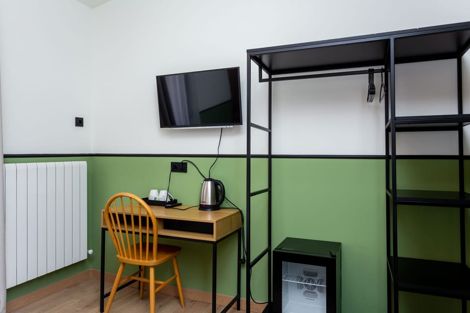 Premium bedding, memory foam beds, minibar, desk