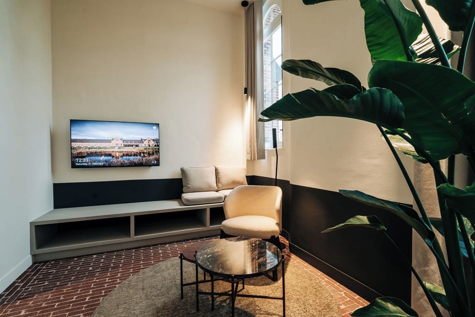 Exclusive Double Room | Living area | 50-cm Smart TV with digital channels, streaming services