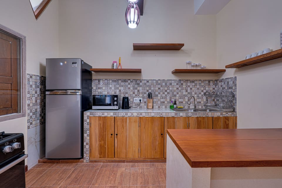 Standard Villa | Private kitchen | Fridge, microwave, stovetop, electric kettle