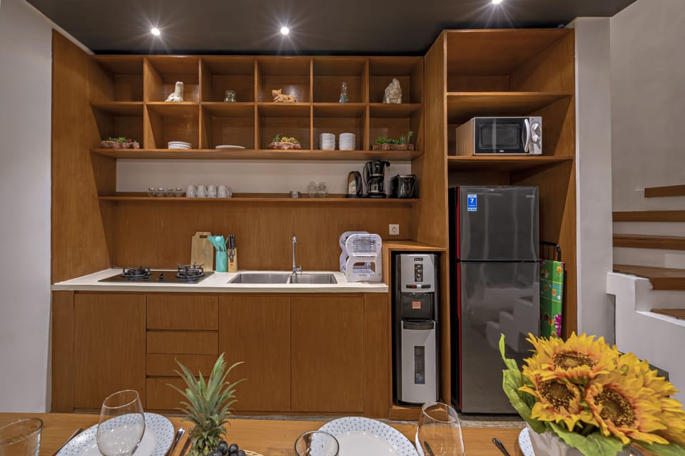 Fridge, microwave, stovetop, coffee/tea maker