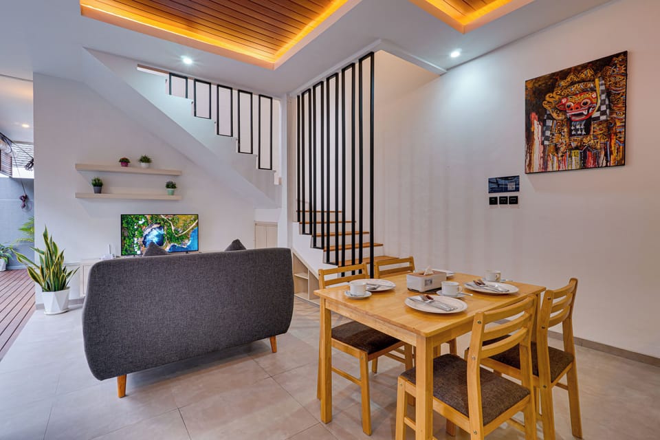Standard Villa | Living area | 43-inch Smart TV with cable channels