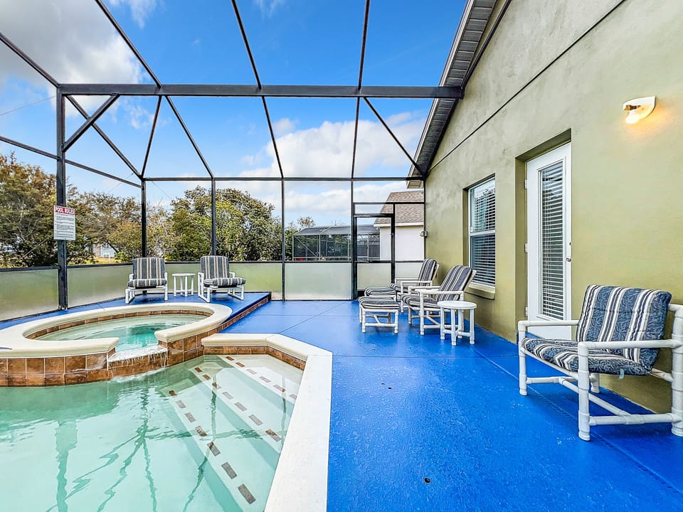 - Refresh in the sparkling pool or unwind in the raised spa with waterfall feature
- Spacious lanai with plenty of cushioned seating for relaxing in the Florida breeze
- Fully screened for comfort and privacy, perfect for lounging morning to evening