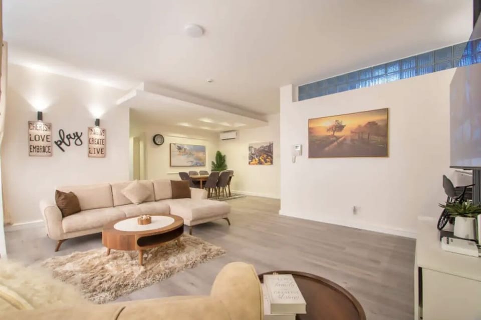 Luxury Apartment | Living area | 52-cm Smart TV with cable channels, Netflix, Hulu