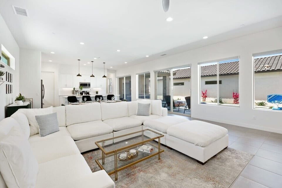 Soft natural light fills this easy, welcoming living room.