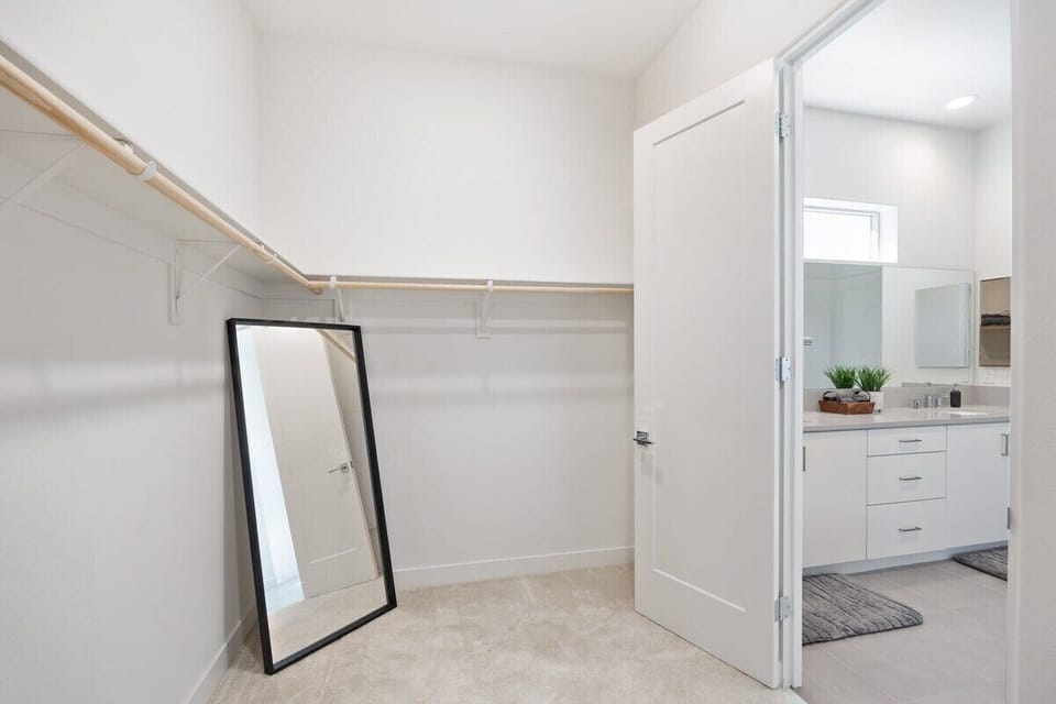 Master closet offering plenty of room to unpack and settle in.