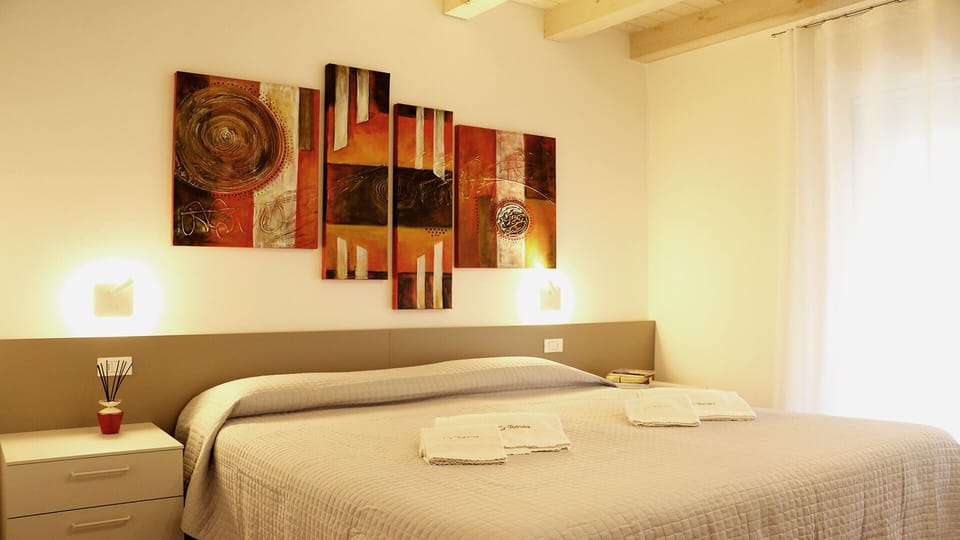 Apartment, 1 King Bed | Premium bedding, individually decorated, individually furnished, desk