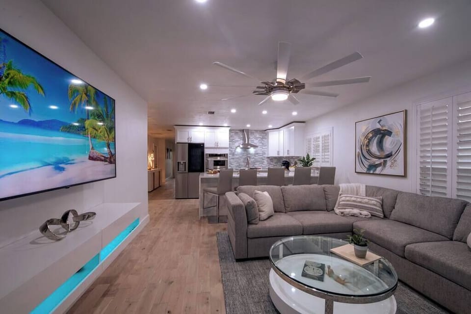This open floor plan offers a seamless flow, fostering a sense of connectivity throughout the entire living area.
