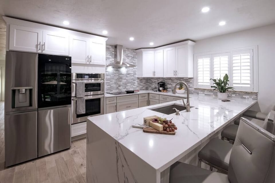 Sleek and modern kitchen with all new stainless appliances
