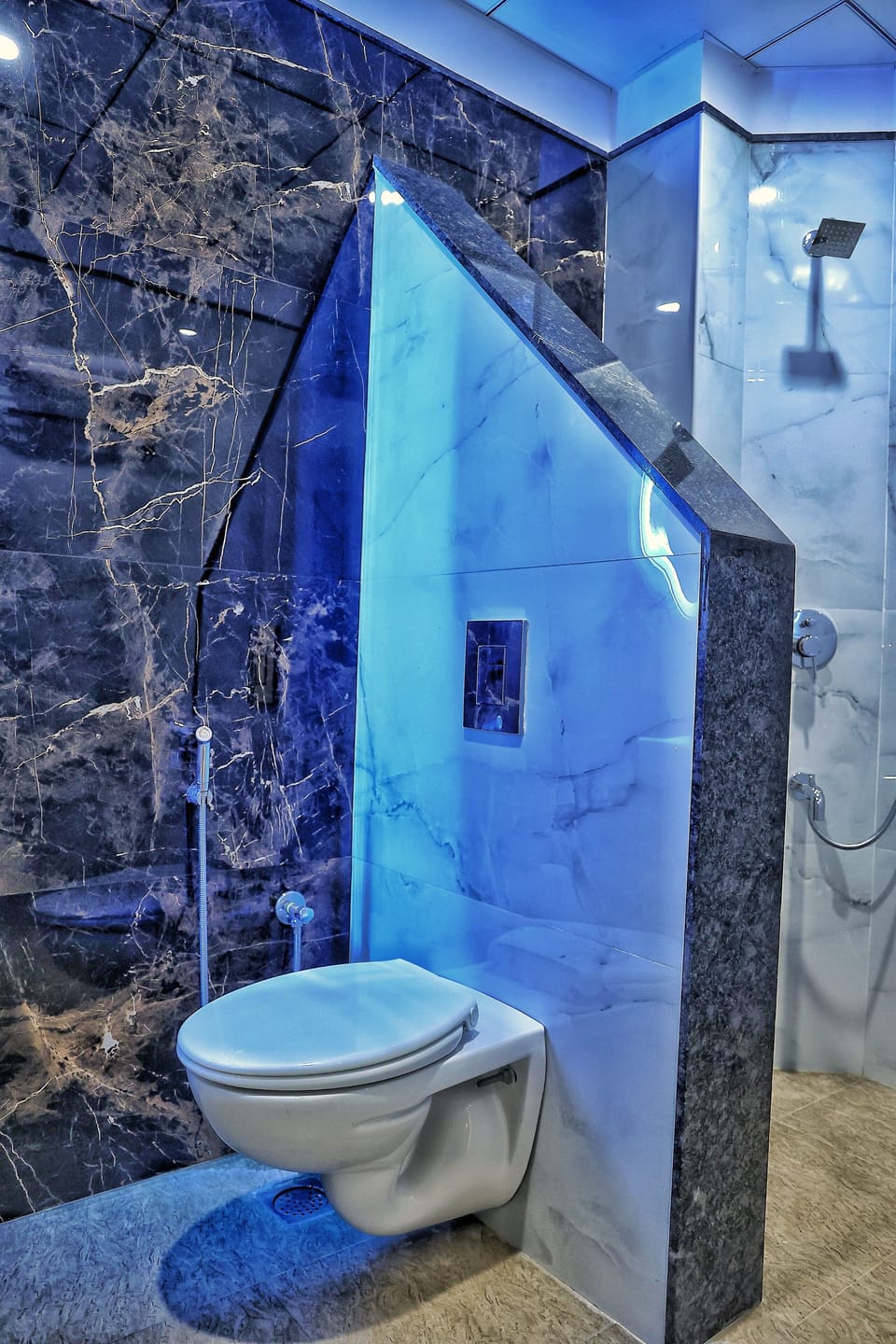 Shower, rainfall showerhead, hair dryer, towels