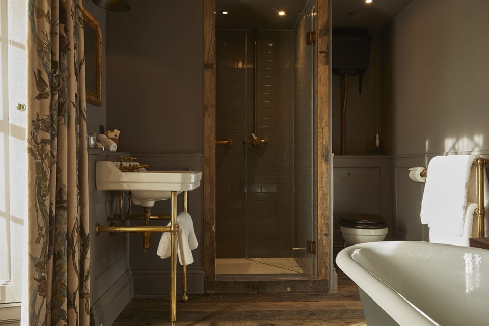 Even Bigger Comfy Luxe room 1 | Bathroom | Shower, rainfall showerhead, hair dryer, bathrobes