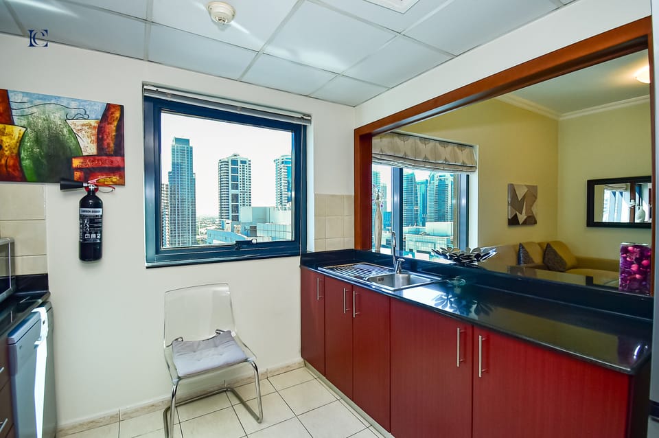 Standard Apartment, 1 Queen Bed | Private kitchen | Full-size fridge, microwave, oven, toaster