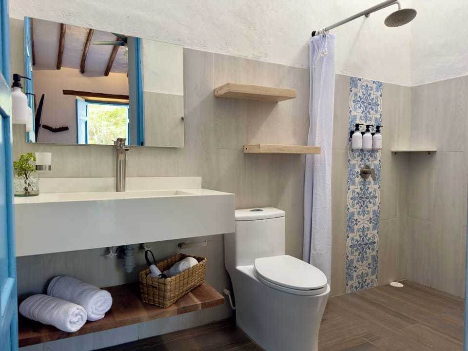 Standard Double Room | Bathroom | Shower, hair dryer, towels, soap