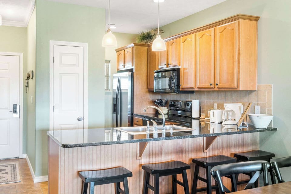 Condo, Multiple Beds, Balcony (Sunset Daydream) | Private kitchen | Coffee/tea maker