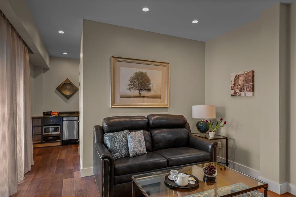 Village Suite - King Bed | Living area | 55-inch LED TV with cable channels, fireplace, Netflix