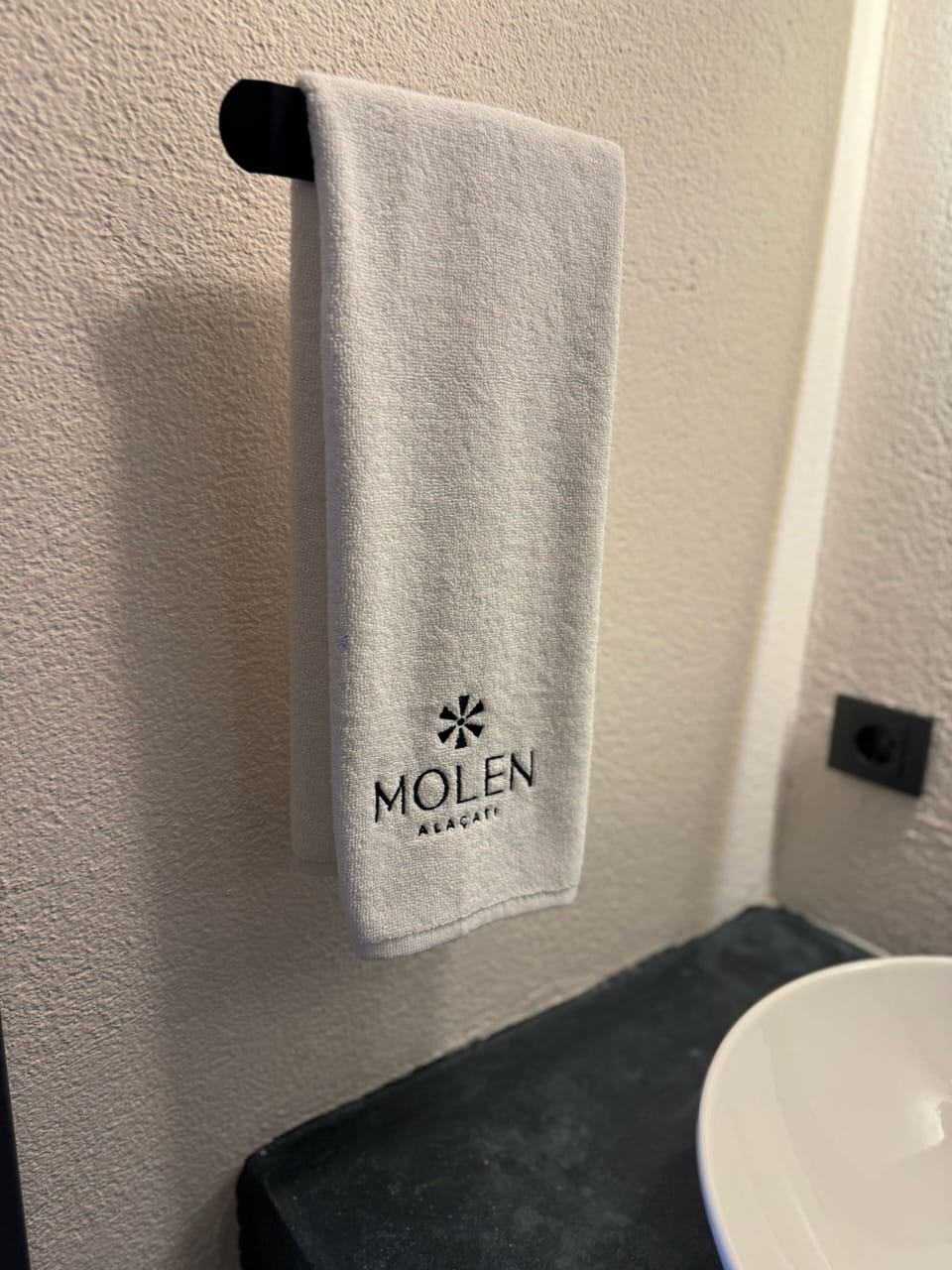 Hair dryer, slippers, towels, soap