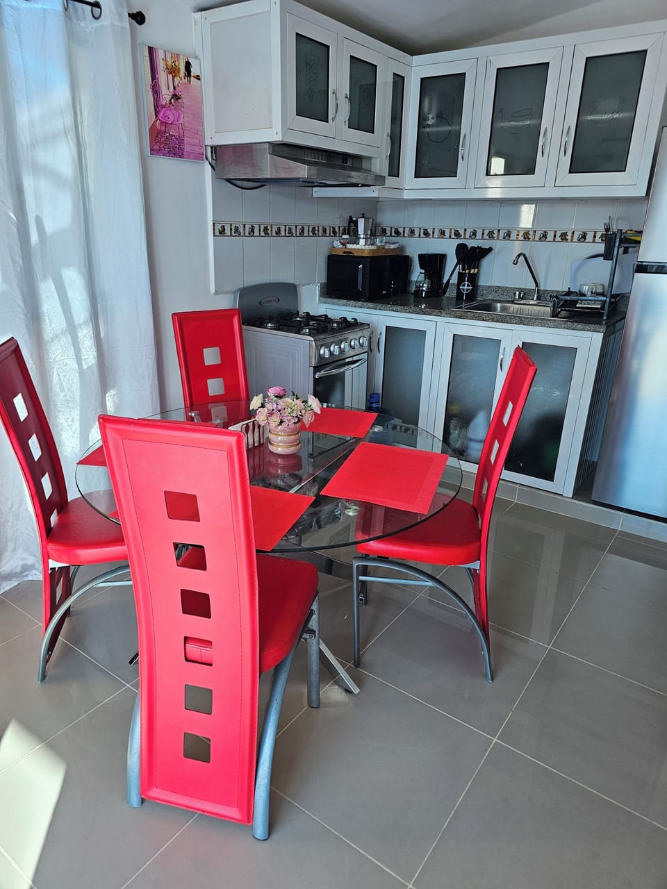 Full-size fridge, microwave (on request), oven, cookware/dishes/utensils