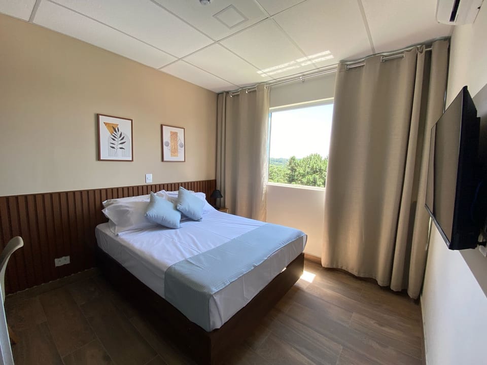 8 bedrooms, blackout drapes, soundproofing, iron/ironing board