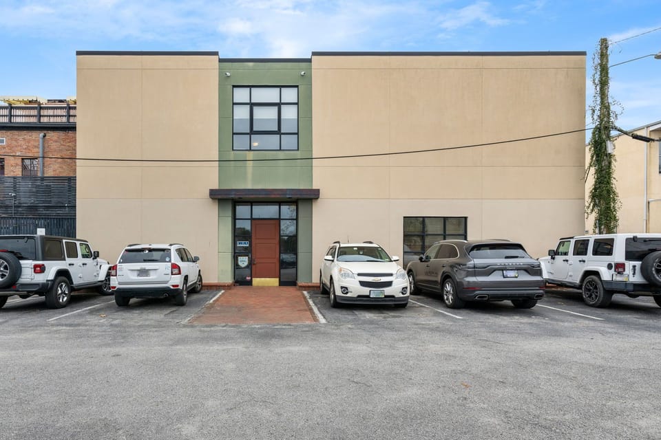 Exterior from the Parking Lot Behind The Building