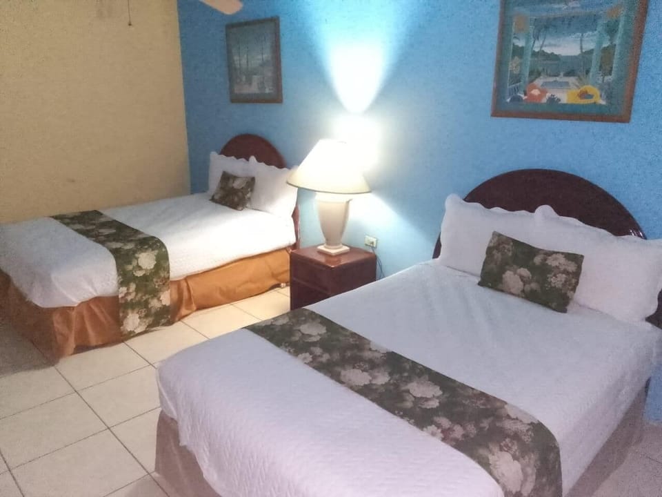 Economy Double Room, 2 Double Beds | In-room dining