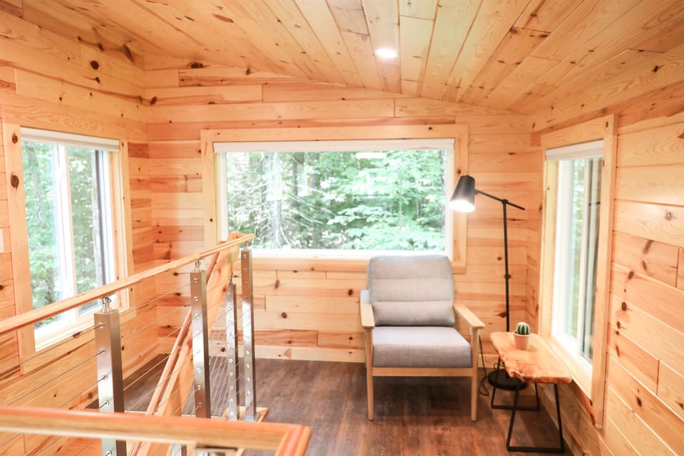 Nature’s cinema. No TV required when the forest view is this spectacular.