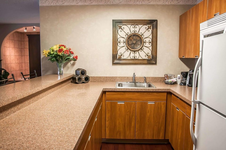 Suite, 1 King Bed, Non Smoking | In-room safe, desk, laptop workspace, blackout drapes