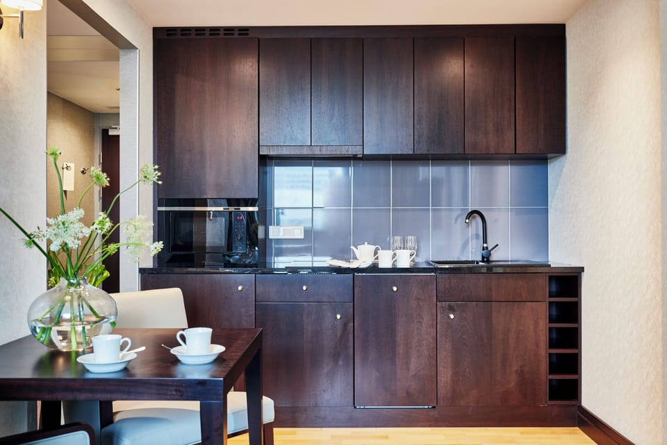 Family Suite, 2 Bedrooms, Kitchenette | Minibar, in-room safe, desk, laptop workspace