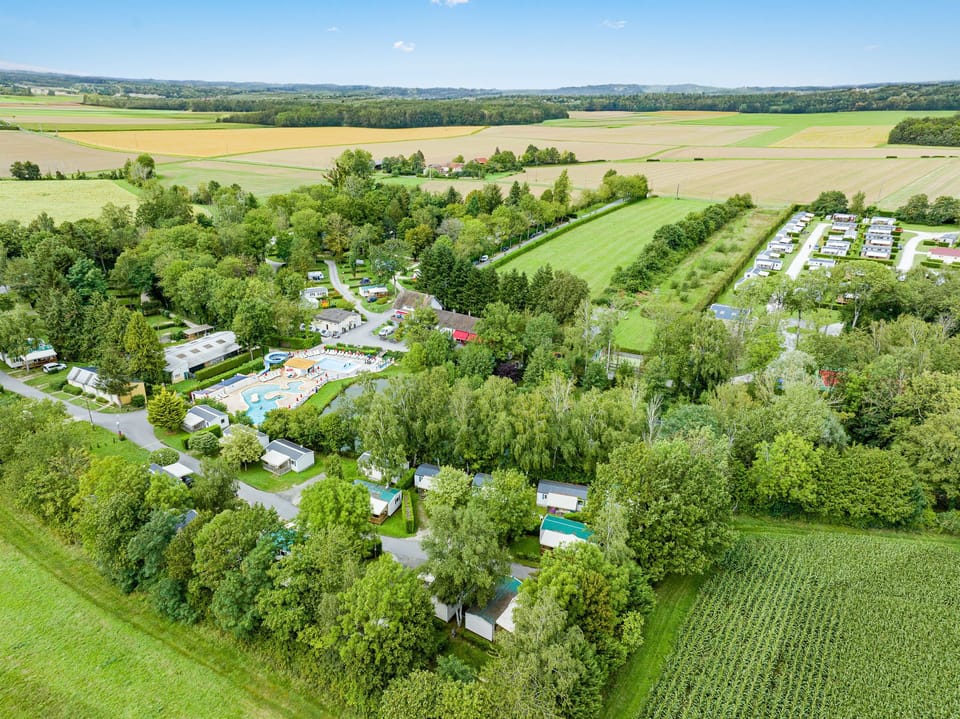 Tucked away in the rolling countryside, this scenic retreat is surrounded by fields and forest, offering guests a peaceful getaway in the heart of nature.