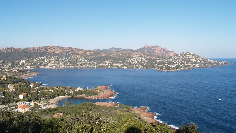 Dive into relaxation as you soak in the sparkling blue waters, surrounded by lush greenery.