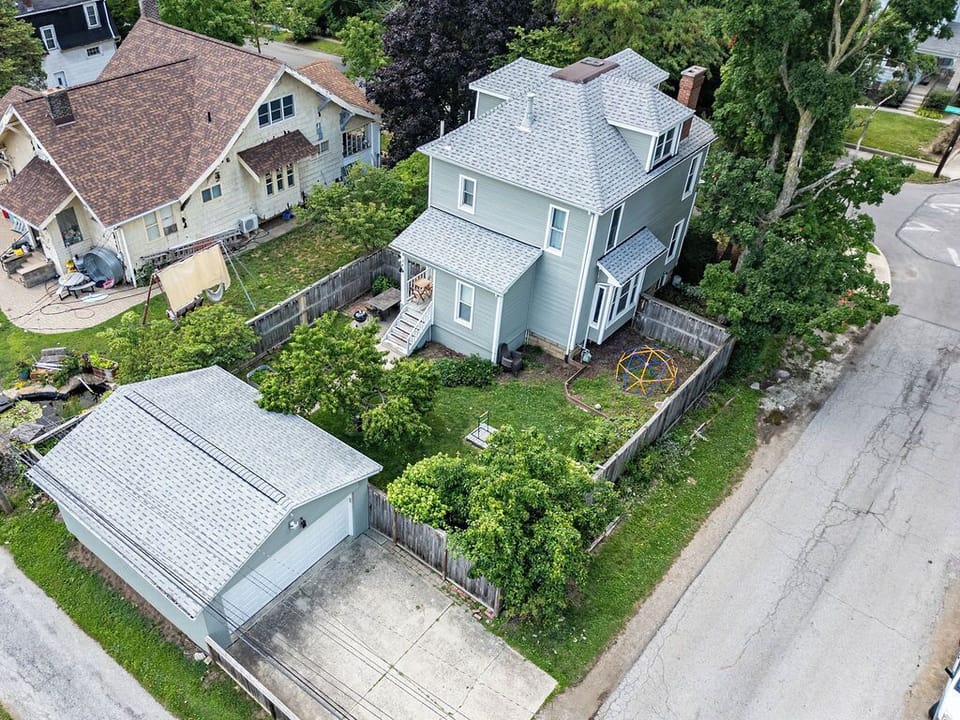 A parent's peace of mind! A bird's-eye view showing our fully enclosed, private backyard space where the kids can play safely.