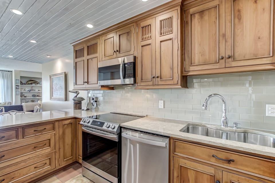 Fully Equipped Kitchen Overlooking Dining and Living Space