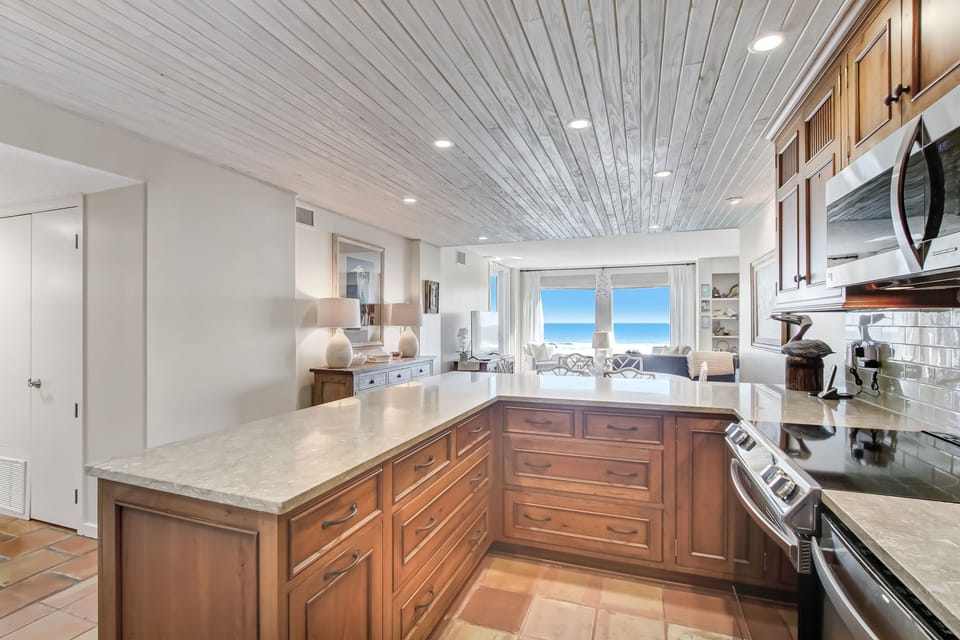 Fully Equipped Kitchen Overlooking Dining and Living Space