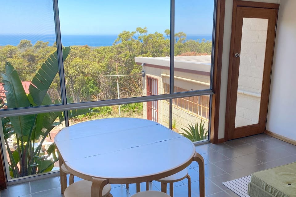 Dining room overlooking the Royal National Park and ocean views